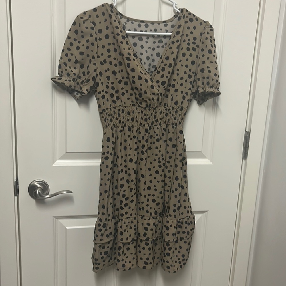 Brown with black spots